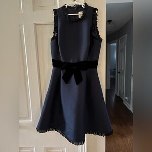 Kate spade blue dress with ruffle accents and black velvet bow